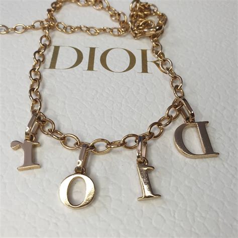 gold dior name necklace|Dior necklace gold letters.